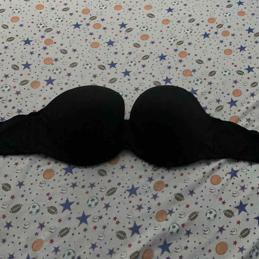 Black strapless Victoria’s Secret bra.